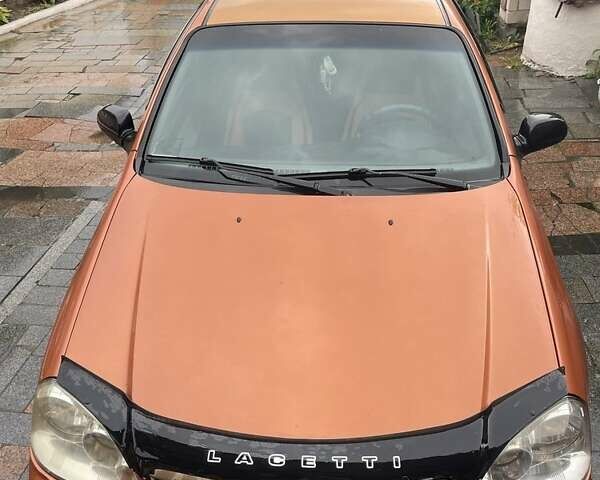 Помаранчевий Шевроле Лачетті, об'ємом двигуна 1.6 л та пробігом 300 тис. км за 2800 $, фото 6 на Automoto.ua