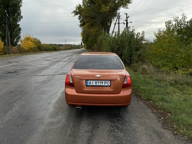 Оранжевый Шевроле Лачетти, объемом двигателя 1.8 л и пробегом 159 тыс. км за 5500 $, фото 7 на Automoto.ua