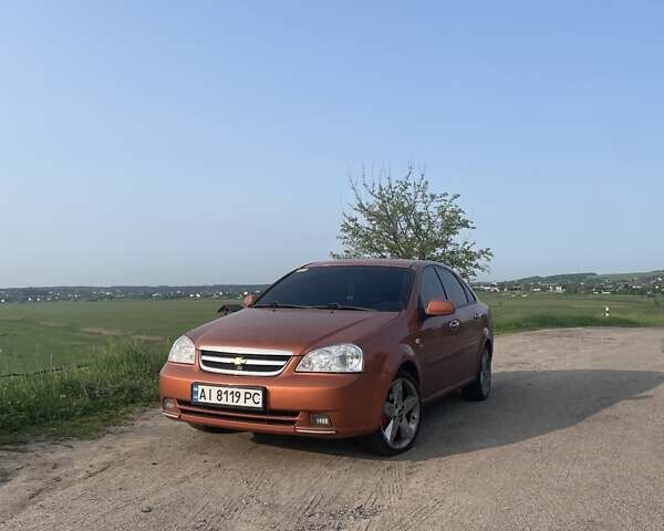 Оранжевый Шевроле Лачетти, объемом двигателя 1.8 л и пробегом 159 тыс. км за 5500 $, фото 1 на Automoto.ua