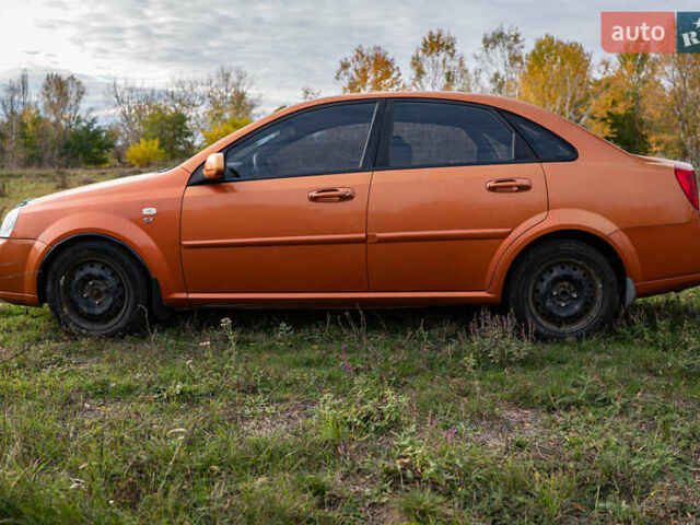 Оранжевый Шевроле Лачетти, объемом двигателя 1.8 л и пробегом 273 тыс. км за 3900 $, фото 10 на Automoto.ua