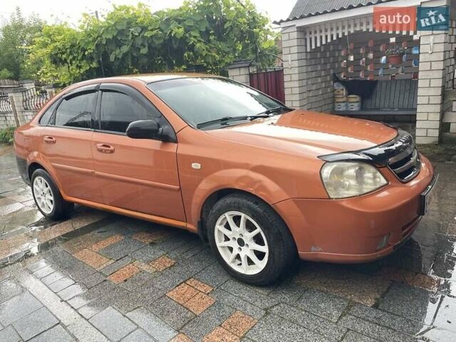 Помаранчевий Шевроле Лачетті, об'ємом двигуна 1.6 л та пробігом 300 тис. км за 2800 $, фото 2 на Automoto.ua