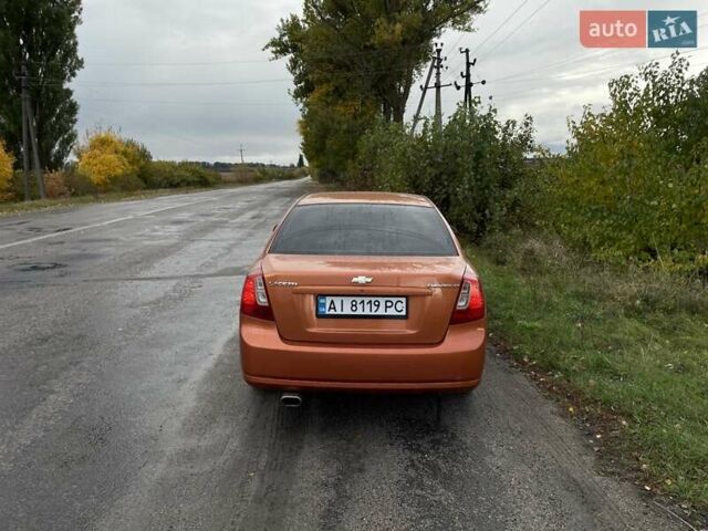 Оранжевый Шевроле Лачетти, объемом двигателя 1.8 л и пробегом 159 тыс. км за 5500 $, фото 6 на Automoto.ua
