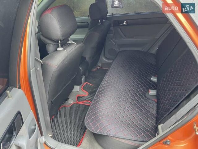 Оранжевый Шевроле Лачетти, объемом двигателя 1.8 л и пробегом 159 тыс. км за 5500 $, фото 10 на Automoto.ua