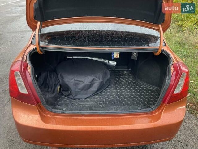 Оранжевый Шевроле Лачетти, объемом двигателя 1.8 л и пробегом 159 тыс. км за 5500 $, фото 7 на Automoto.ua
