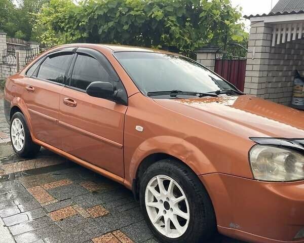 Помаранчевий Шевроле Лачетті, об'ємом двигуна 1.6 л та пробігом 300 тис. км за 2800 $, фото 3 на Automoto.ua
