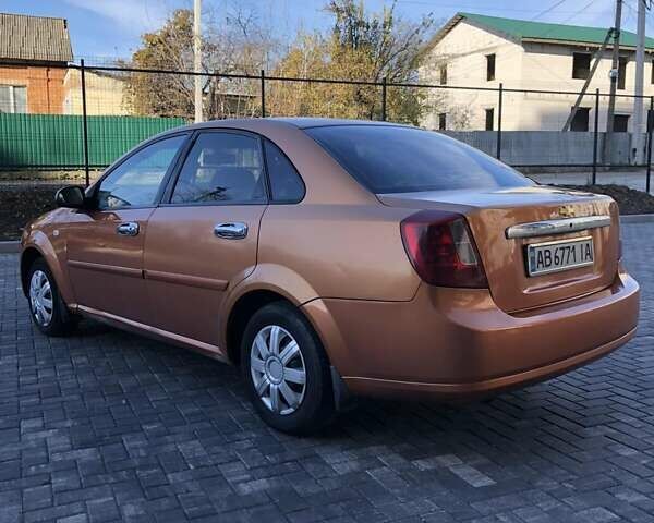 Оранжевый Шевроле Лачетти, объемом двигателя 1.6 л и пробегом 285 тыс. км за 3499 $, фото 15 на Automoto.ua