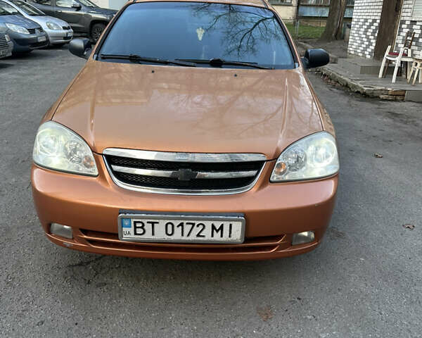 Помаранчевий Шевроле Лачетті, об'ємом двигуна 1.6 л та пробігом 375 тис. км за 4200 $, фото 10 на Automoto.ua