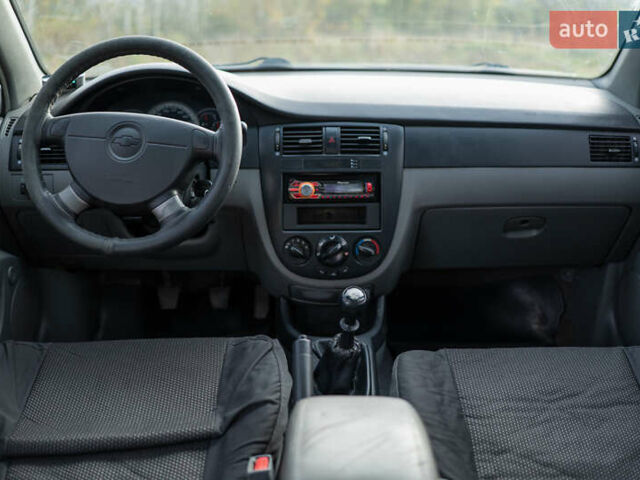 Оранжевый Шевроле Лачетти, объемом двигателя 1.8 л и пробегом 273 тыс. км за 3900 $, фото 22 на Automoto.ua