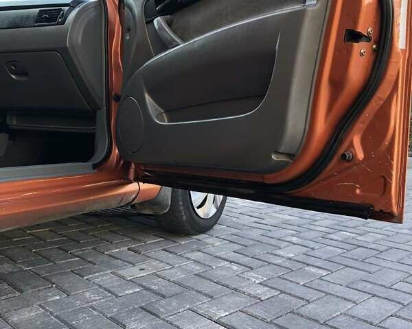 Оранжевый Шевроле Лачетти, объемом двигателя 1.6 л и пробегом 285 тыс. км за 3499 $, фото 9 на Automoto.ua