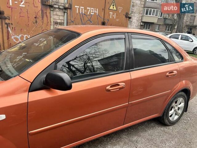 Оранжевый Шевроле Лачетти, объемом двигателя 1.6 л и пробегом 176 тыс. км за 4300 $, фото 5 на Automoto.ua