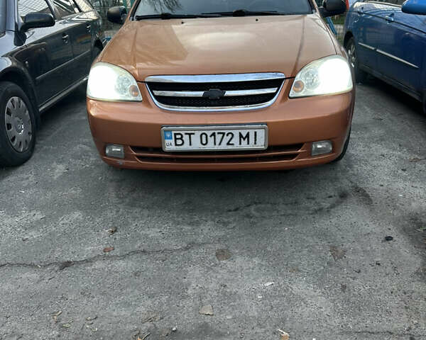 Помаранчевий Шевроле Лачетті, об'ємом двигуна 1.6 л та пробігом 375 тис. км за 4200 $, фото 13 на Automoto.ua