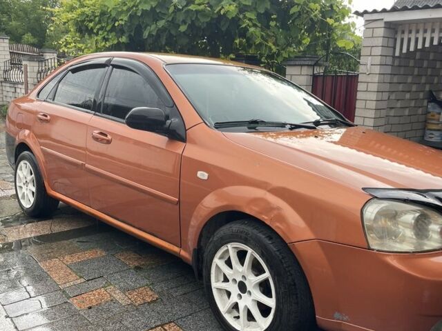 Помаранчевий Шевроле Лачетті, об'ємом двигуна 1.6 л та пробігом 300 тис. км за 2800 $, фото 4 на Automoto.ua