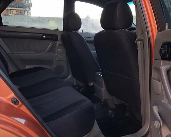 Оранжевый Шевроле Лачетти, объемом двигателя 1.6 л и пробегом 285 тыс. км за 3499 $, фото 18 на Automoto.ua