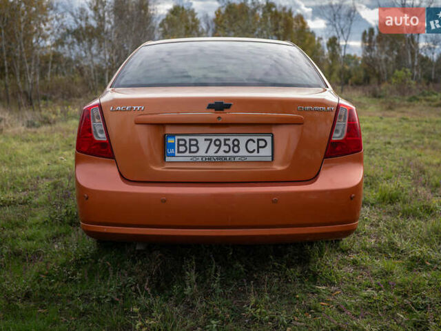 Оранжевый Шевроле Лачетти, объемом двигателя 1.8 л и пробегом 273 тыс. км за 3900 $, фото 7 на Automoto.ua