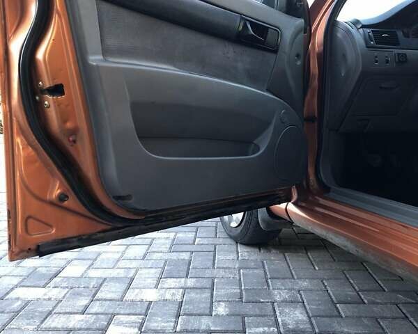 Оранжевый Шевроле Лачетти, объемом двигателя 1.6 л и пробегом 285 тыс. км за 3499 $, фото 14 на Automoto.ua