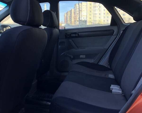 Оранжевый Шевроле Лачетти, объемом двигателя 1.6 л и пробегом 285 тыс. км за 3499 $, фото 10 на Automoto.ua