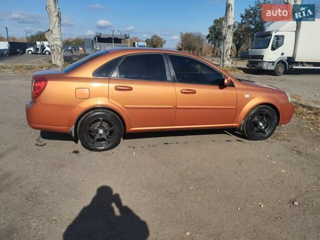 Помаранчевий Шевроле Лачетті, об'ємом двигуна 1.8 л та пробігом 207 тис. км за 4400 $, фото 9 на Automoto.ua