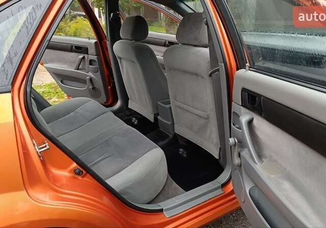 Оранжевый Шевроле Лачетти, объемом двигателя 1.6 л и пробегом 267 тыс. км за 3600 $, фото 3 на Automoto.ua