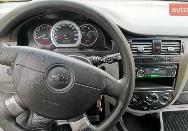 Оранжевый Шевроле Лачетти, объемом двигателя 1.6 л и пробегом 267 тыс. км за 3600 $, фото 4 на Automoto.ua