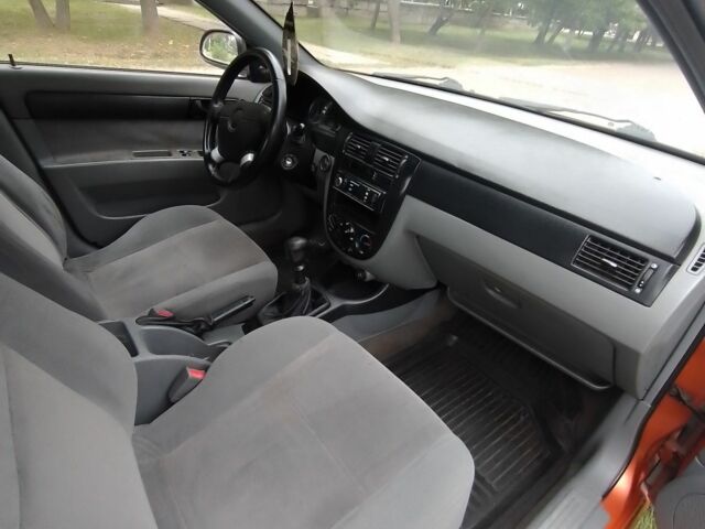 Оранжевый Шевроле Лачетти, объемом двигателя 1.6 л и пробегом 160 тыс. км за 2500 $, фото 3 на Automoto.ua