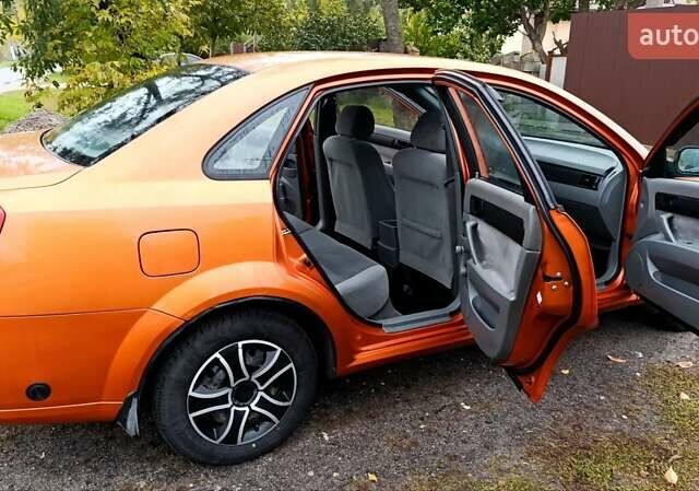Оранжевый Шевроле Лачетти, объемом двигателя 1.6 л и пробегом 267 тыс. км за 3600 $, фото 7 на Automoto.ua
