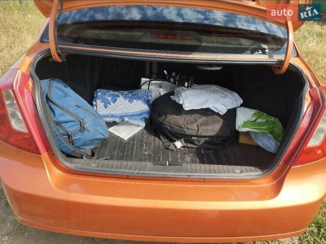 Помаранчевий Шевроле Лачетті, об'ємом двигуна 1.8 л та пробігом 207 тис. км за 4400 $, фото 1 на Automoto.ua