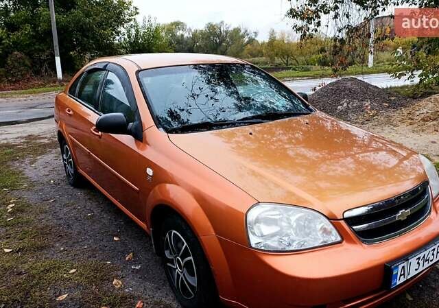 Оранжевый Шевроле Лачетти, объемом двигателя 1.6 л и пробегом 267 тыс. км за 3600 $, фото 9 на Automoto.ua