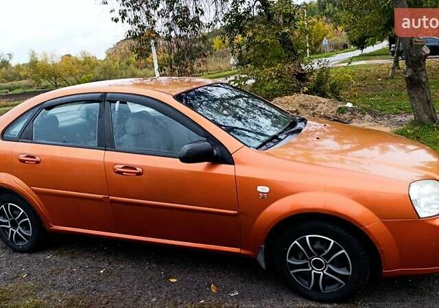 Оранжевый Шевроле Лачетти, объемом двигателя 1.6 л и пробегом 267 тыс. км за 3600 $, фото 8 на Automoto.ua