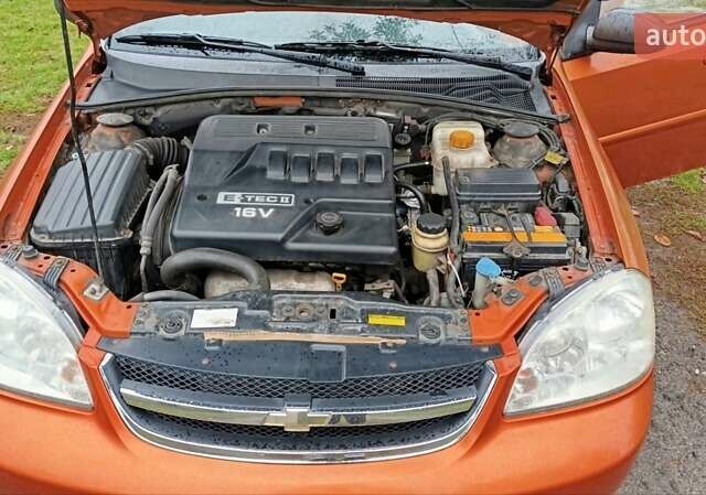 Оранжевый Шевроле Лачетти, объемом двигателя 1.6 л и пробегом 267 тыс. км за 3600 $, фото 5 на Automoto.ua
