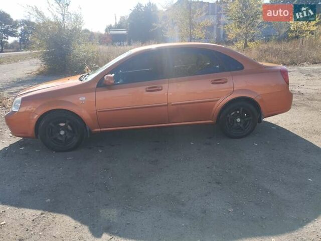Помаранчевий Шевроле Лачетті, об'ємом двигуна 1.8 л та пробігом 207 тис. км за 4400 $, фото 6 на Automoto.ua