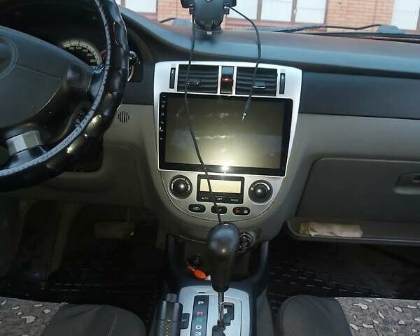 Помаранчевий Шевроле Лачетті, об'ємом двигуна 1.8 л та пробігом 230 тис. км за 5200 $, фото 1 на Automoto.ua