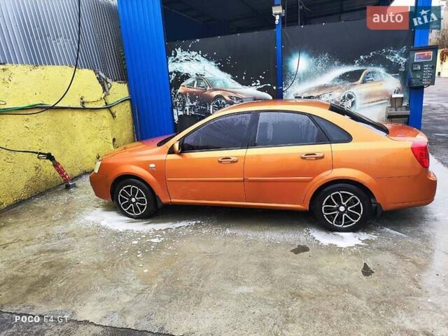 Помаранчевий Шевроле Лачетті, об'ємом двигуна 1.8 л та пробігом 218 тис. км за 5700 $, фото 10 на Automoto.ua