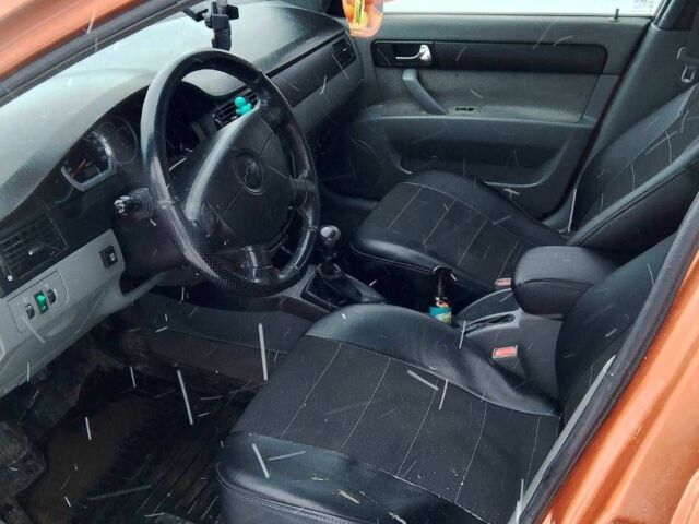 Помаранчевий Шевроле Лачетті, об'ємом двигуна 1.8 л та пробігом 300 тис. км за 2950 $, фото 6 на Automoto.ua