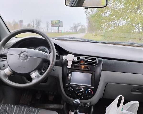 Оранжевый Шевроле Лачетти, объемом двигателя 1.6 л и пробегом 335 тыс. км за 4300 $, фото 16 на Automoto.ua