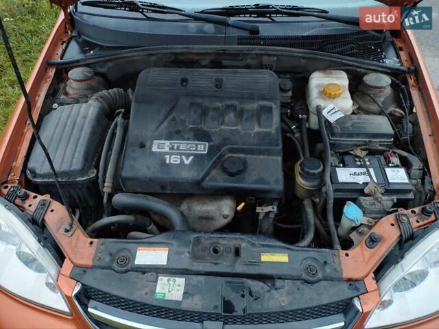 Оранжевый Шевроле Лачетти, объемом двигателя 1.6 л и пробегом 335 тыс. км за 4300 $, фото 14 на Automoto.ua