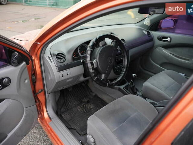 Оранжевый Шевроле Лачетти, объемом двигателя 1.8 л и пробегом 300 тыс. км за 3302 $, фото 23 на Automoto.ua