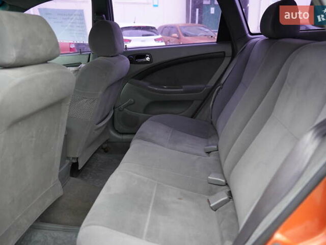 Оранжевый Шевроле Лачетти, объемом двигателя 1.8 л и пробегом 300 тыс. км за 3302 $, фото 21 на Automoto.ua