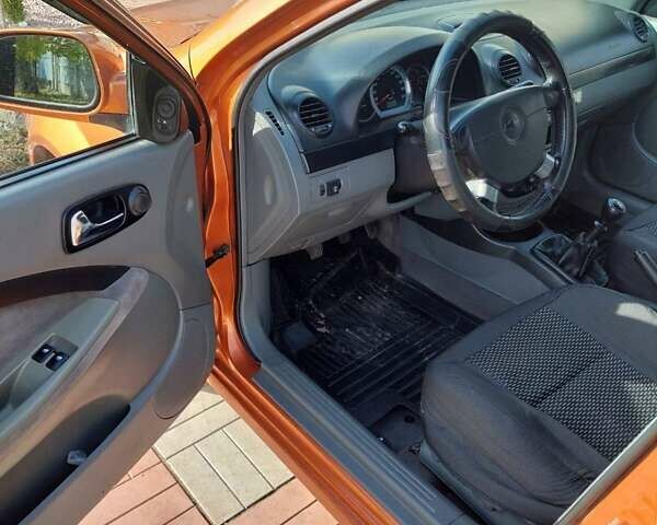 Оранжевый Шевроле Лачетти, объемом двигателя 1.8 л и пробегом 270 тыс. км за 5300 $, фото 6 на Automoto.ua