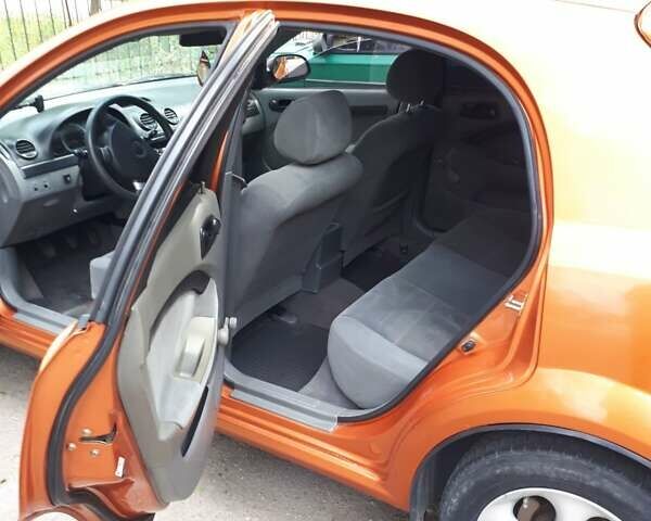 Оранжевый Шевроле Лачетти, объемом двигателя 1.6 л и пробегом 179 тыс. км за 4500 $, фото 18 на Automoto.ua