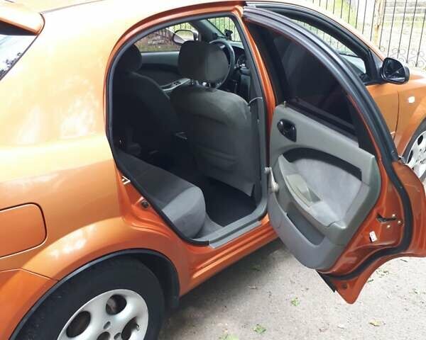 Оранжевый Шевроле Лачетти, объемом двигателя 1.6 л и пробегом 179 тыс. км за 4500 $, фото 5 на Automoto.ua