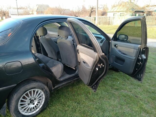 Чорний Шевроле Ланос, об'ємом двигуна 1.5 л та пробігом 208 тис. км за 3000 $, фото 5 на Automoto.ua