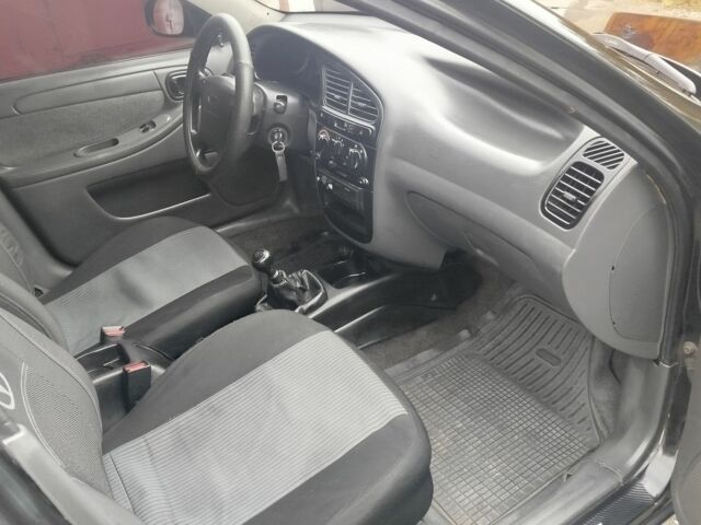 Чорний Шевроле Ланос, об'ємом двигуна 1.5 л та пробігом 206 тис. км за 2950 $, фото 11 на Automoto.ua