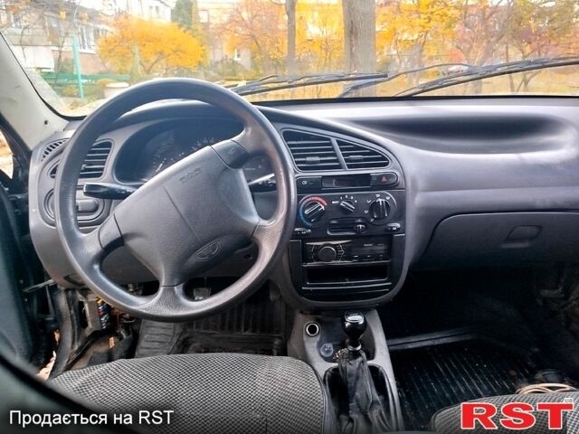 Черный Шевроле Ланос, объемом двигателя 1.5 л и пробегом 480 тыс. км за 1500 $, фото 1 на Automoto.ua