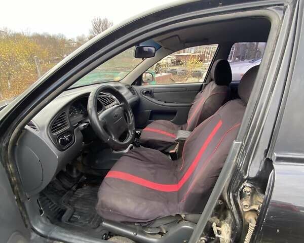 Черный Шевроле Ланос, объемом двигателя 1.5 л и пробегом 200 тыс. км за 2800 $, фото 8 на Automoto.ua