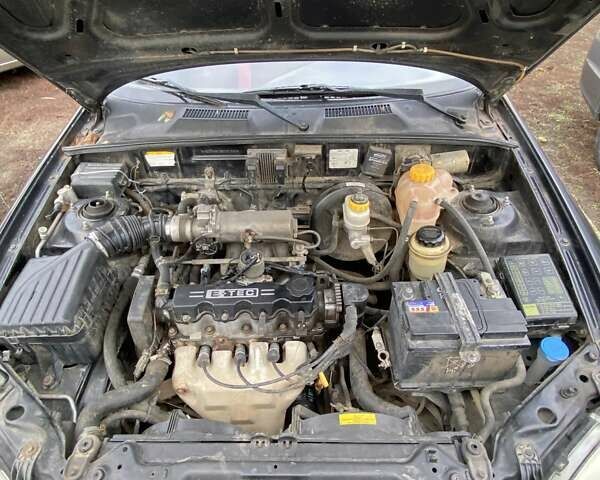 Черный Шевроле Ланос, объемом двигателя 1.5 л и пробегом 200 тыс. км за 2800 $, фото 11 на Automoto.ua