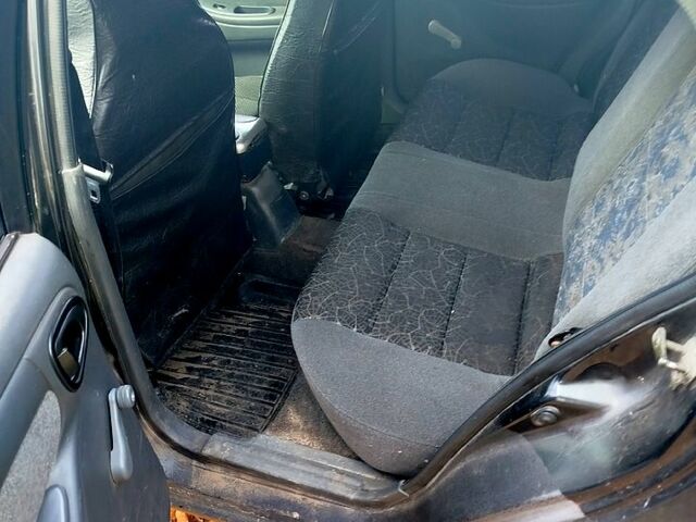 Черный Шевроле Ланос, объемом двигателя 1.5 л и пробегом 480 тыс. км за 1500 $, фото 4 на Automoto.ua