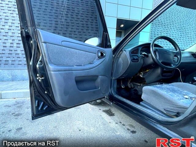 Чорний Шевроле Ланос, об'ємом двигуна 1.5 л та пробігом 217 тис. км за 2330 $, фото 7 на Automoto.ua