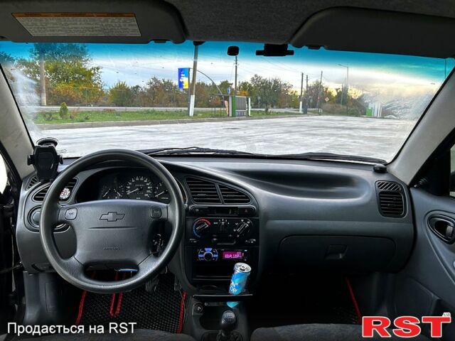 Чорний Шевроле Ланос, об'ємом двигуна 1.5 л та пробігом 250 тис. км за 2300 $, фото 7 на Automoto.ua