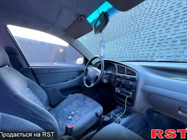 Чорний Шевроле Ланос, об'ємом двигуна 1.5 л та пробігом 217 тис. км за 2330 $, фото 5 на Automoto.ua