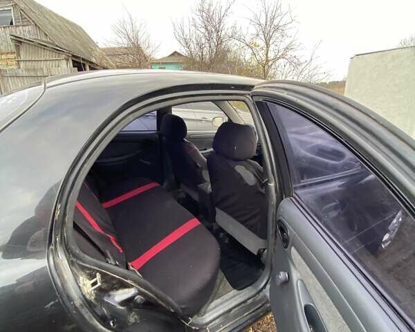 Черный Шевроле Ланос, объемом двигателя 1.5 л и пробегом 200 тыс. км за 2800 $, фото 10 на Automoto.ua